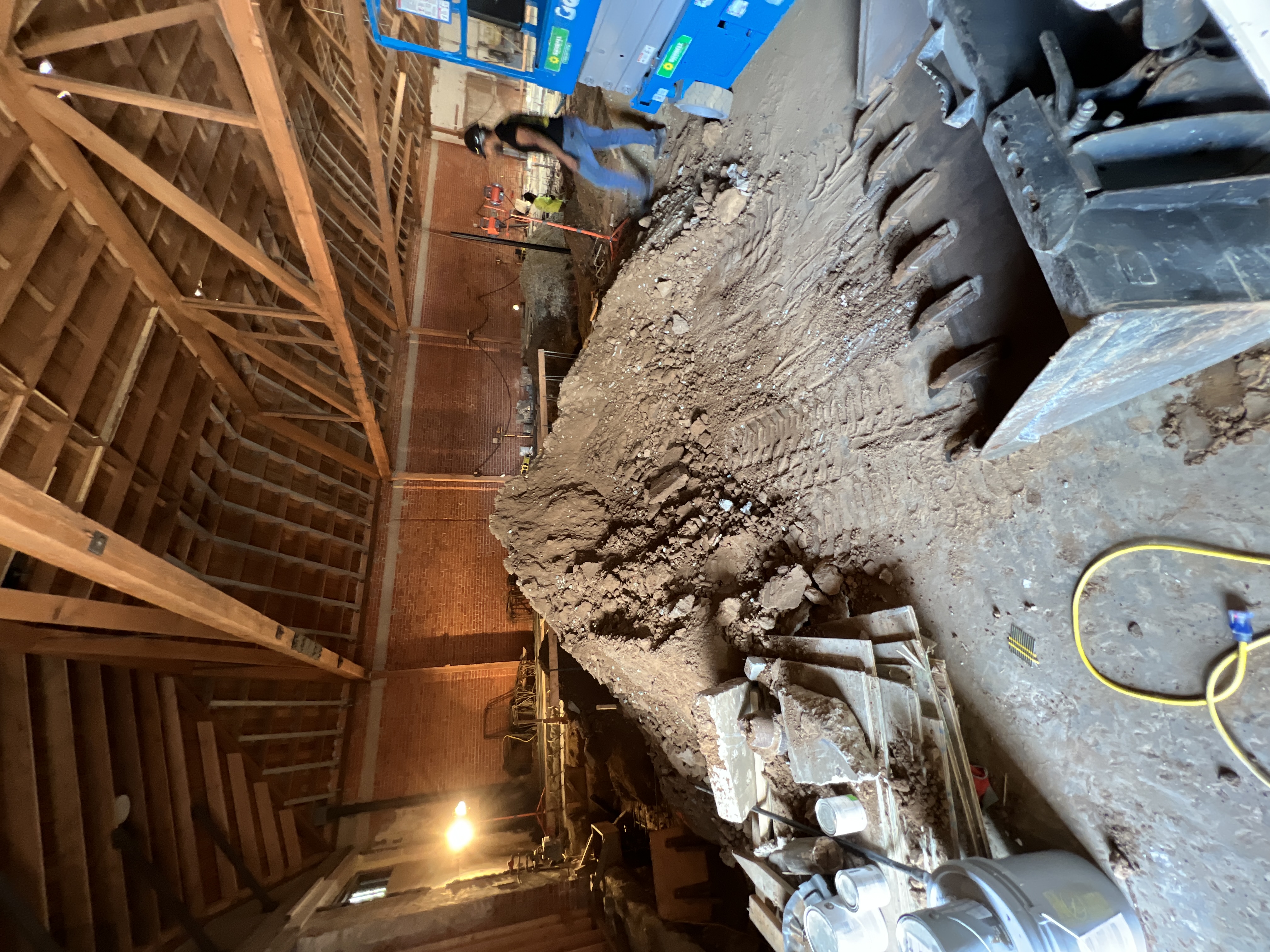 Before: commercial construction site with dirt and debris