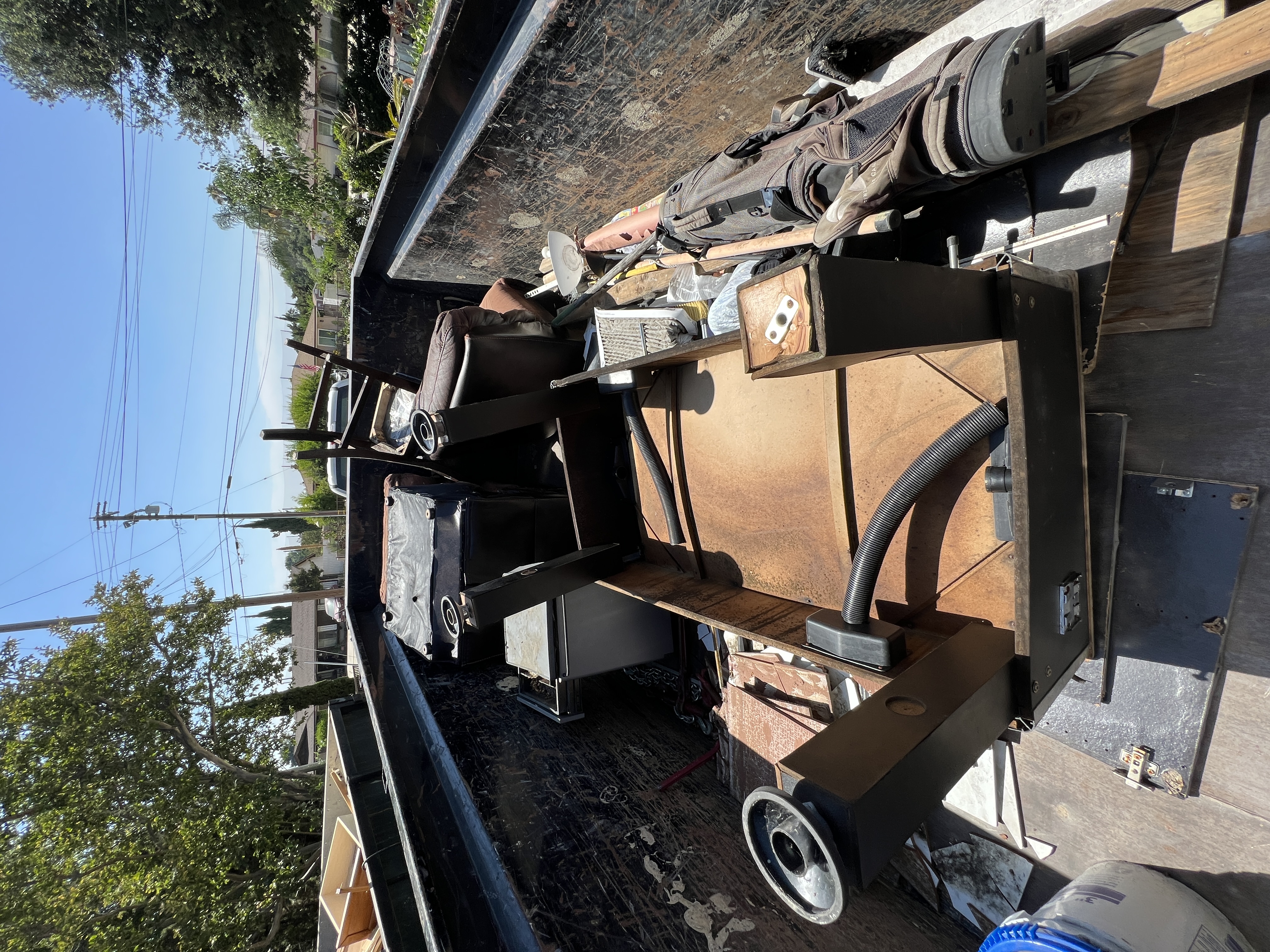 After: JunkFit truck loaded with furniture hauled away