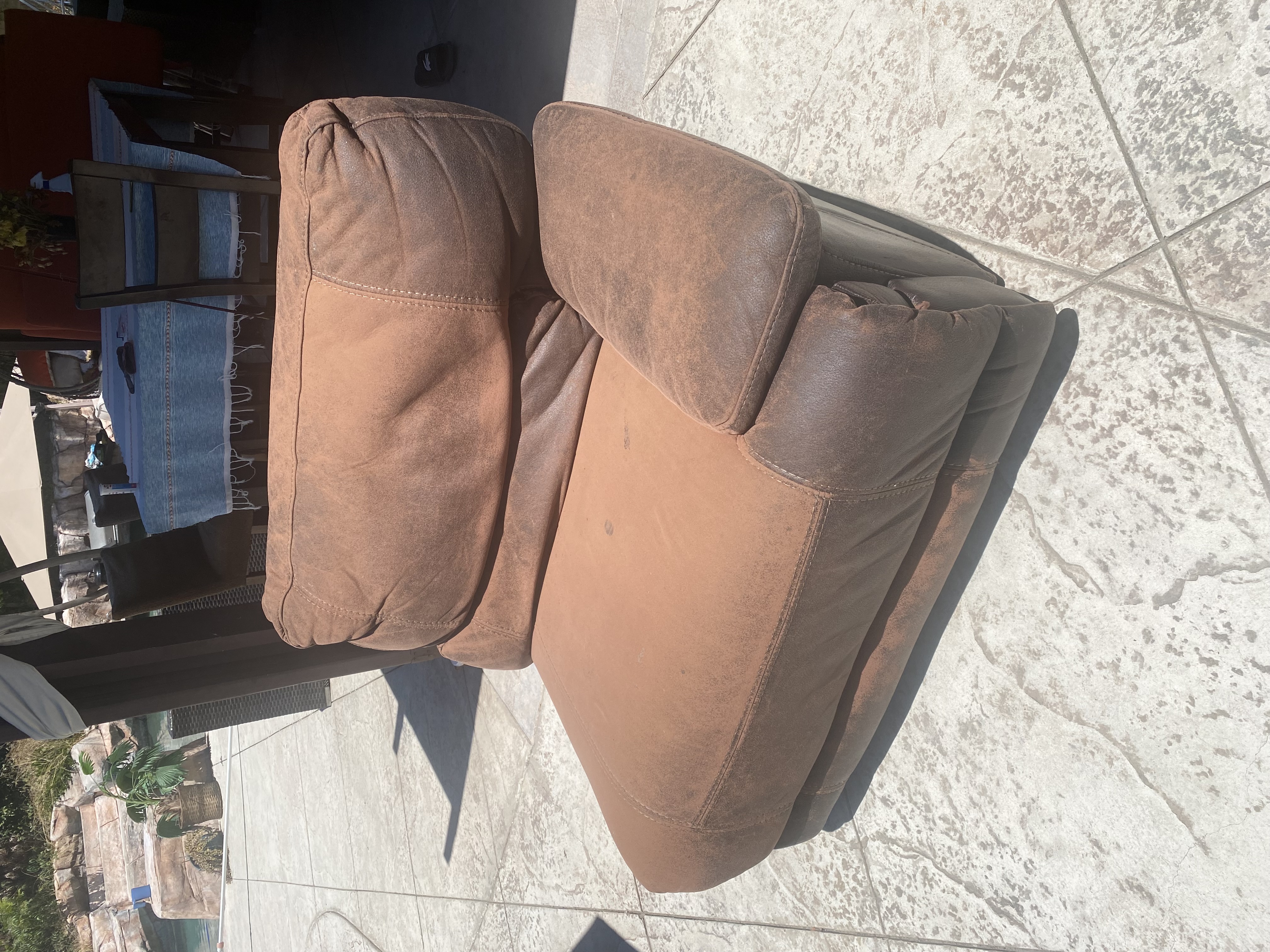 Before: old couch sitting outside ready for removal