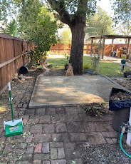 Clean backyard patio after shed removal by JunkFit Hauling
